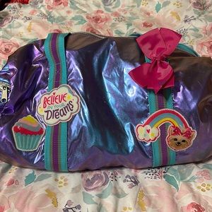 JOJO duffel bag with mirror vibrant colors. Purple the main color.